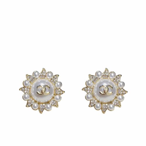 CHANEL SUNBURST PEARL AND CRYSTAL EARRINGS IN GOLD TONE